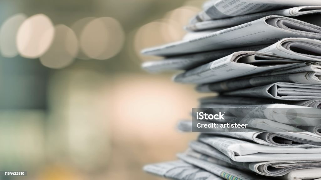 Newspaper. Pile of newspapers on white background Newspaper Stock Photo