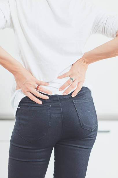 istock Hip, back and spinal problems in adult ages. 1184424821