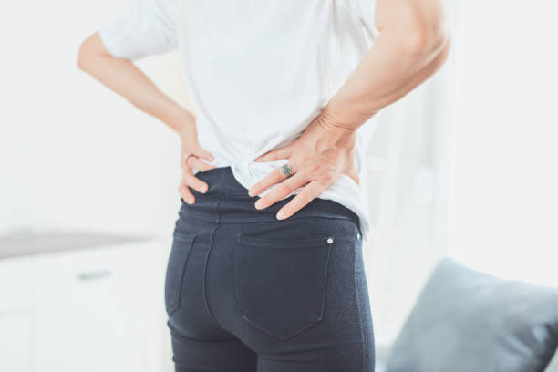 istock Hip, back and spinal problems in adult ages. 1184424931