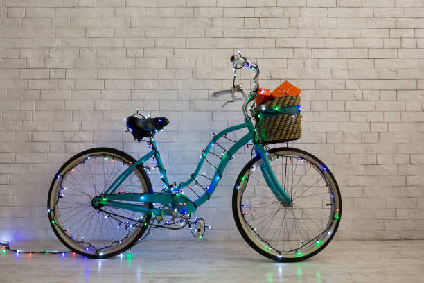 istock Christmas bicycle ready for delivering presents over bricks wall 1184424956