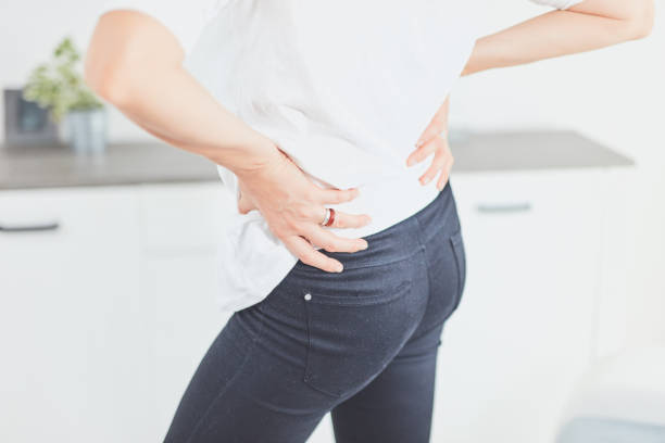 istock Hip, back and spinal problems in adult ages. 1184424967