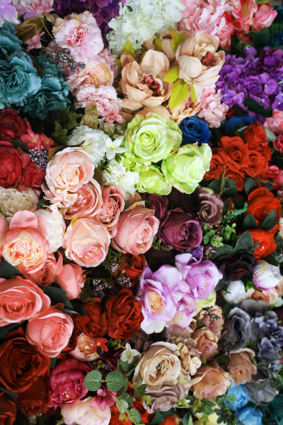 istock Multicolored imitation flowers 1184425102