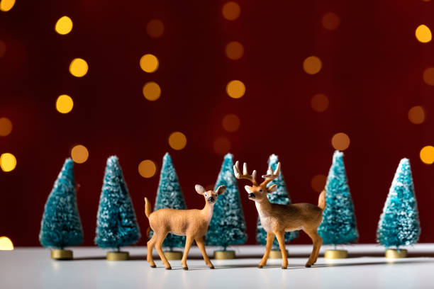 istock Christmas holiday theme with deer 1184425177