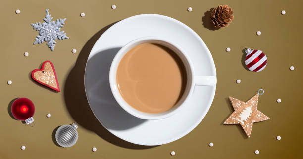 istock Christmas ornaments with a cup of coffee 1184425311