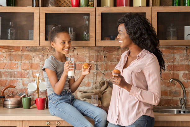 Mother and daughter spending time together, having lunch