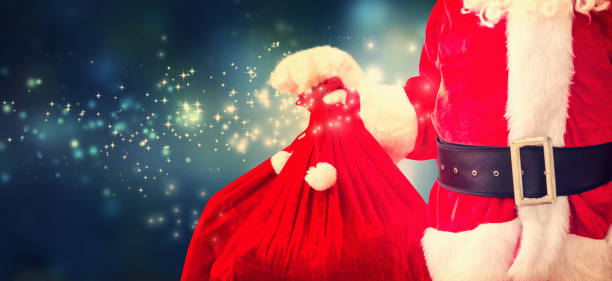 istock Santa holding a red sack 1184425975