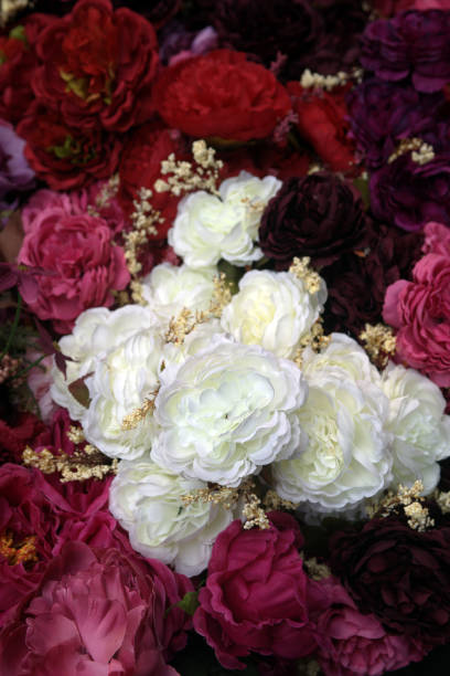istock Multicolored imitation flowers 1184427555