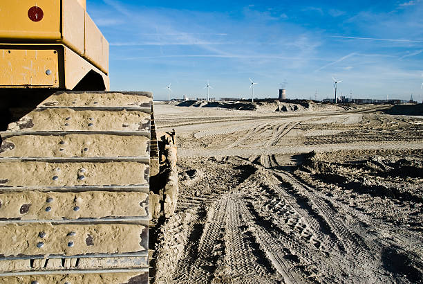 heavy machinery at construction site stock photo