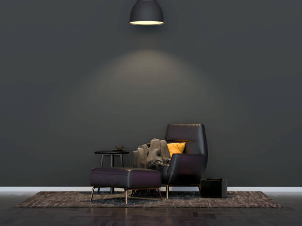 istock A lamp hangs above the armchair 1184428681