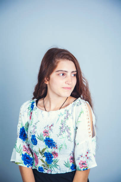 istock young beautiful woman in studio 1184433577