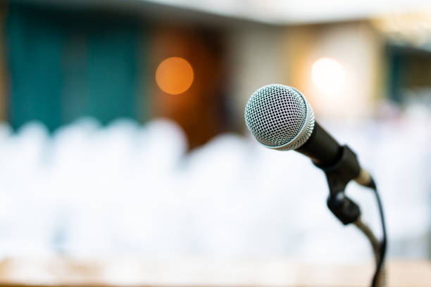 istock Wired microphone in meeting room. 1184433590