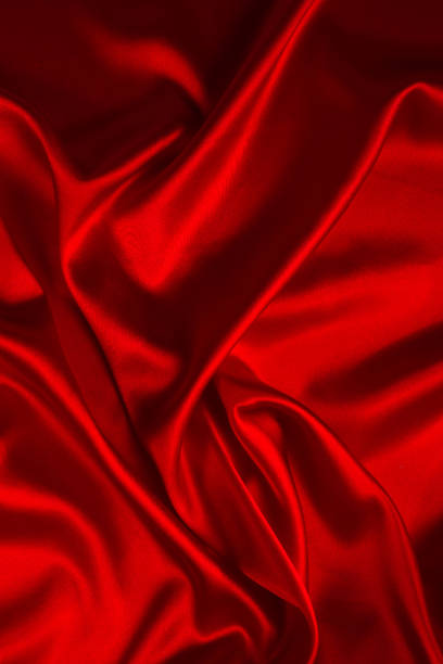 istock Red silk or satin luxury fabric texture can use as abstract background. Top view. 1184436389