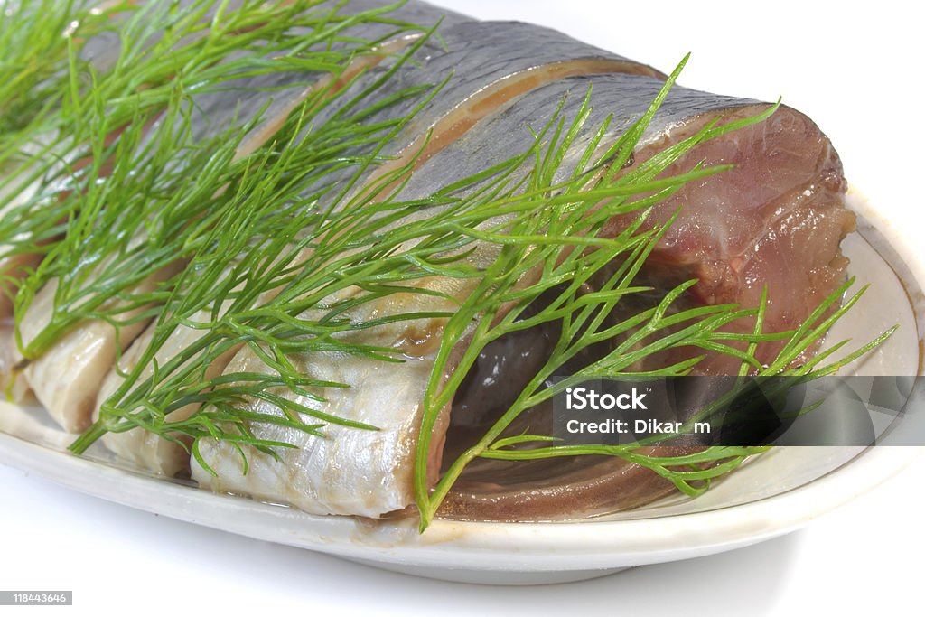 Segments of salty herring with fennel.  Color Image Stock Photo