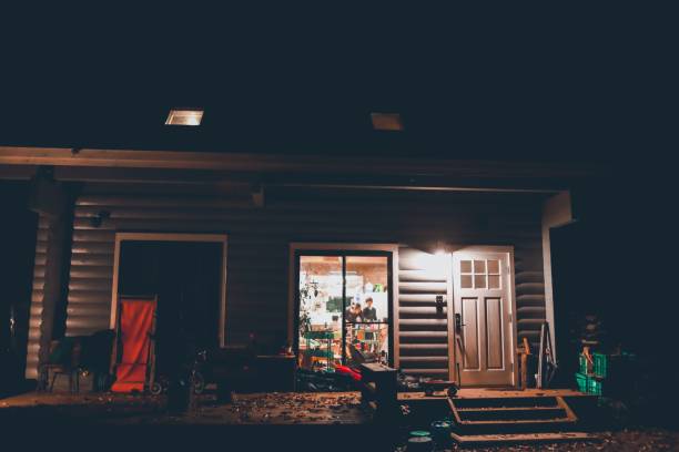 istock log cabin seen through the window 1184438050