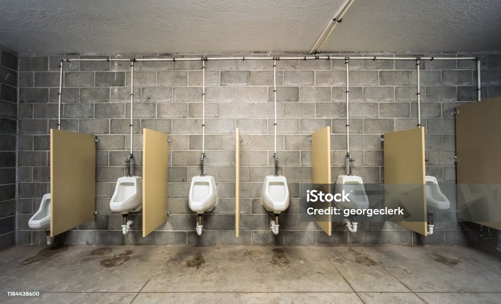 Urinals In A Basic Mens Public Toilet Stock Photo - Download Image Now -  Urinal, Public Restroom, Bathroom - iStock