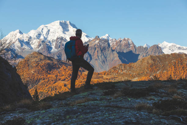 istock Male Solo Traveller on Mountain Trail 1184442990