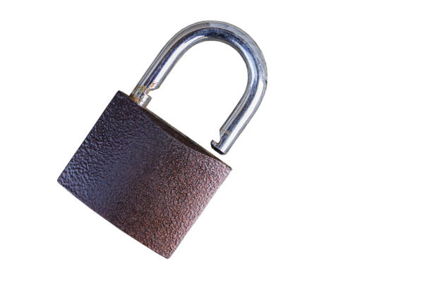 istock Old padlock on a clean white background in the open state 1184443463