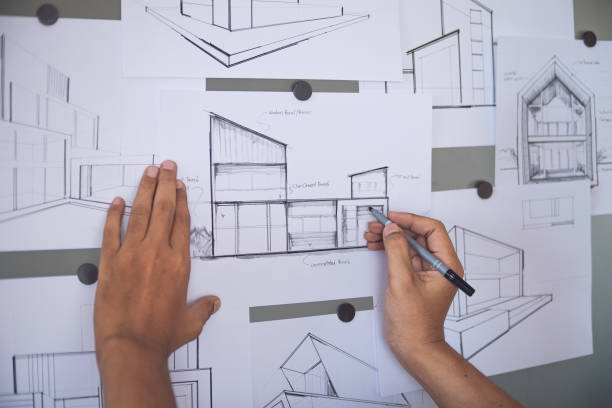 istock Architect Designer Engineer sketching drawing draft working Perspective Sketch  design house construction Project 1184444474