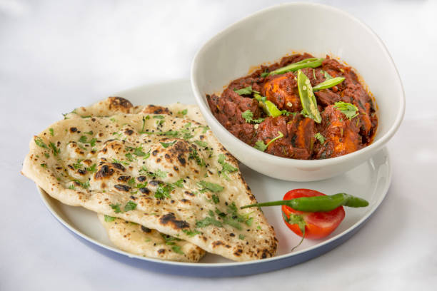 istock Indian Chicken Curry with Naan Bread 1184444743
