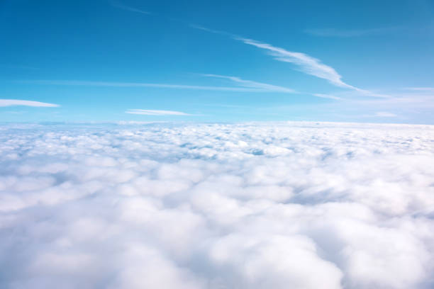 istock Aerial view of cloudy fields and horizon with day blue sky. 1184447047