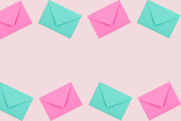 istock Turquoise and green envelopes in a row. Place for text. 1184450509