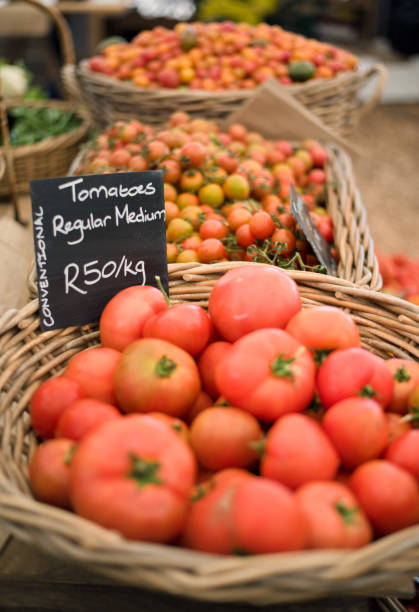 Fresh juicy tomatoes at a market stall