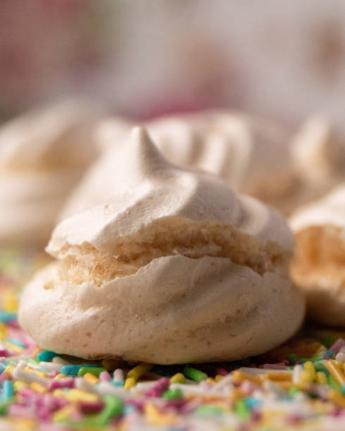 istock meringue and pink background 1184453911