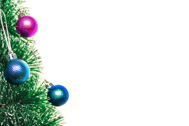 istock Christmas tree with colorful balls on a white background. Space for recording. Pink, blue christmas balls. 1184455768