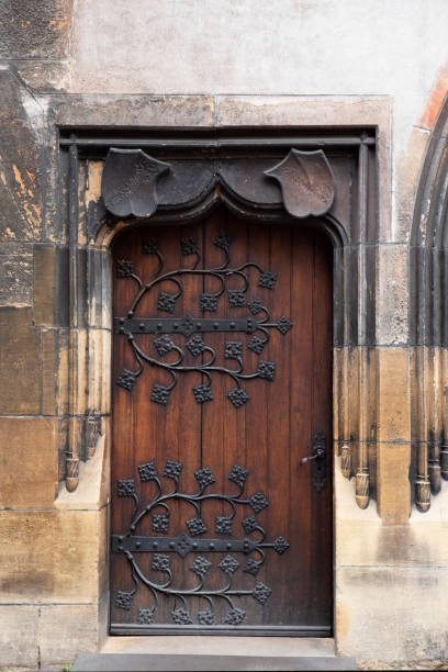 istock Architecture of an old wooden door and ironwork 1184456097