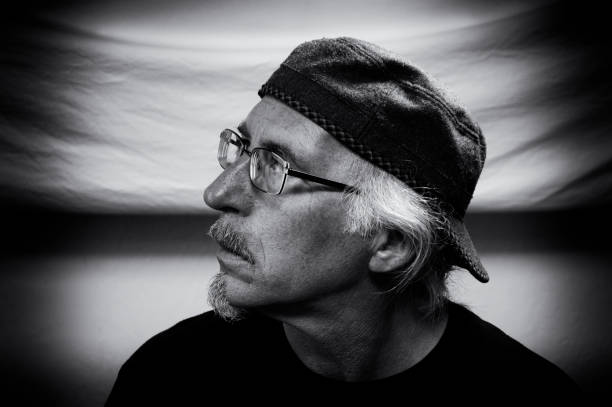 istock black and white profile of man with glasses 1184460277