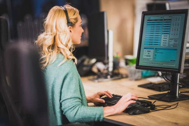 istock Blonde woman pollster working 1184460362