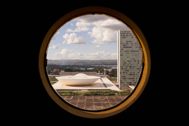 Brasília, DF, Brazil - April 29th, 2019: Brazilian National Congress buildings projected by Oscar Niemeyer considered a key figure of modern architecture, viewed from Annex IV building, Brasília (DF).