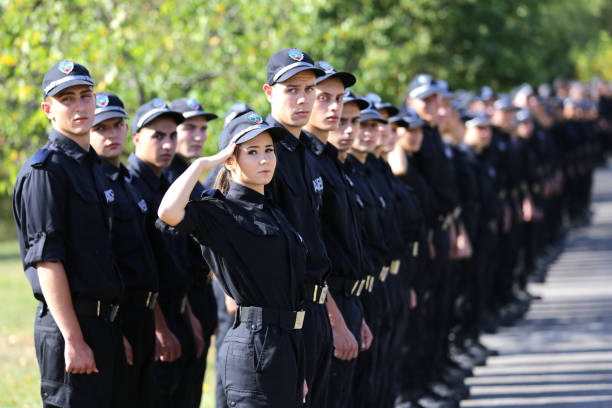 Sofia, Bulgaria - 1 October, 2019: Young policemen and policewomen students stand in formation during the start of the academy year.