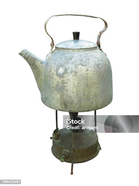 https://media.istockphoto.com/id/1184472491/photo/old-dirty-kettle-teapot-on-a-kerosene-burner-over-white.jpg?s=612x612&w=is&k=20&c=Ym6oSGCjpZAOqReu_HpGy07U8U3j5PC0Y8S7eMxvIl8=