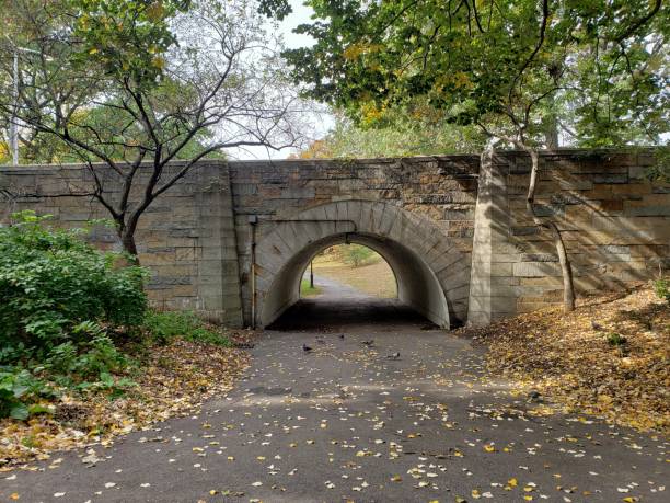istock Riverside park stone tunnel underpass 1184473874