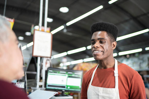 istock Happy cashier working at wholesale 1184479418