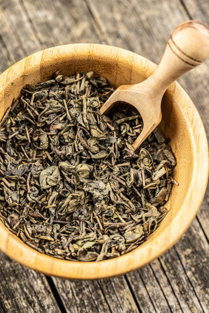 istock Dried green tea leaves. 1184480763