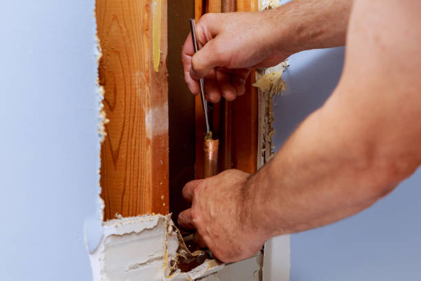 istock Plumber working with copper pipe master cleaning fittings 1184489414