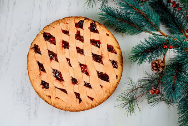 istock Homemade apple pie cake and chistmas decorations 1184495658