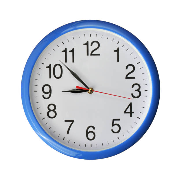 Blue vintage wall clock on an isolated white background