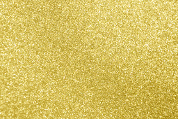istock Abstract gold glitter sparkle bokeh light background 1184502740
