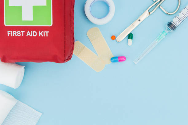istock First aid kit with medical equipment, on light blue background with copy-space 1184502831
