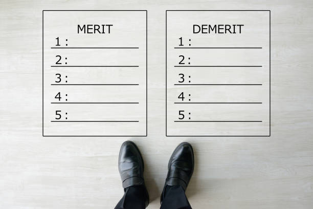 istock Business man thinking about merit and demerit 1184503257