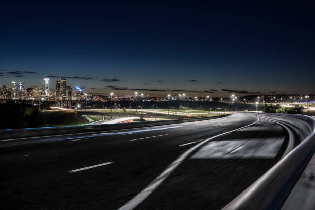 istock Canada, Calgary night cityscape with motion traffic 1184508289