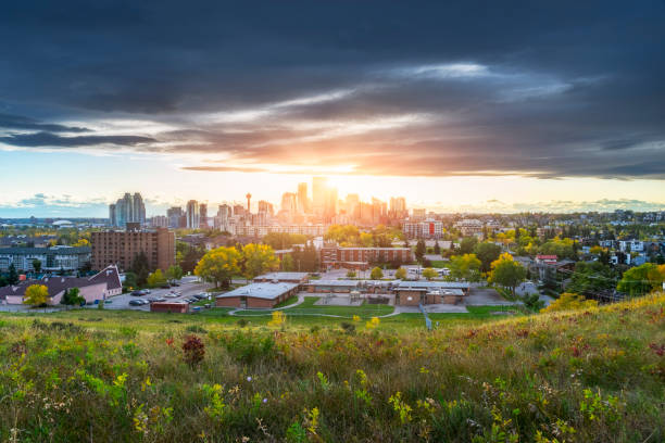Canada, Calgary, Panoramic view of city at sunset in the fall