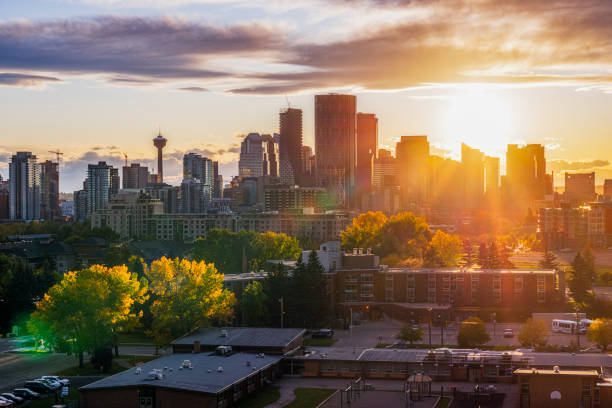 Canada, Calgary, Panoramic view of city at sunset in the fall