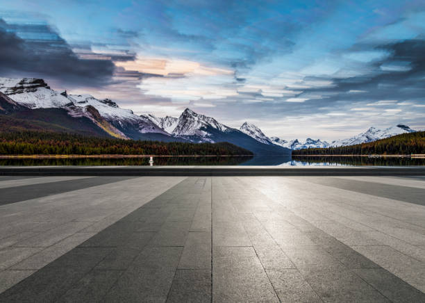 istock Empty observation patio front of Maligne Lake and snowy mountains 1184513968