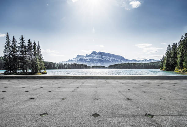 istock Empty patio front of Lake and mountains 1184514246