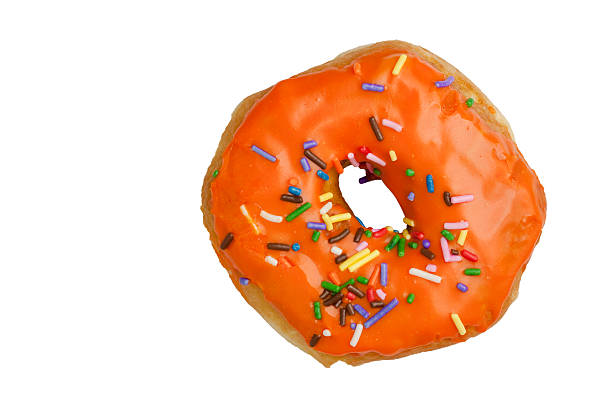 istock Orange Glazed Donut with Rainbow Sprinkles 118451957