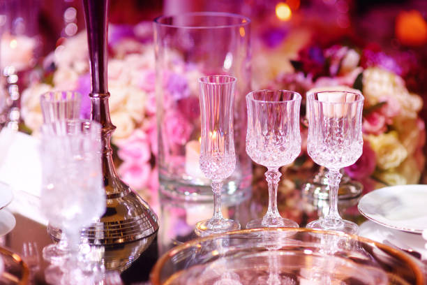 istock Beautiful table setting with crockery and flowers for a party, wedding reception or other festive event 1184527843
